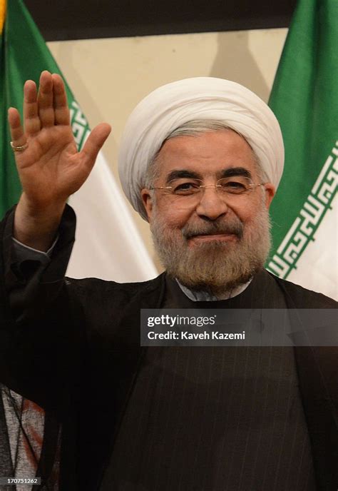 Irans President Elect Hassan Rouhani Waves During His First Press