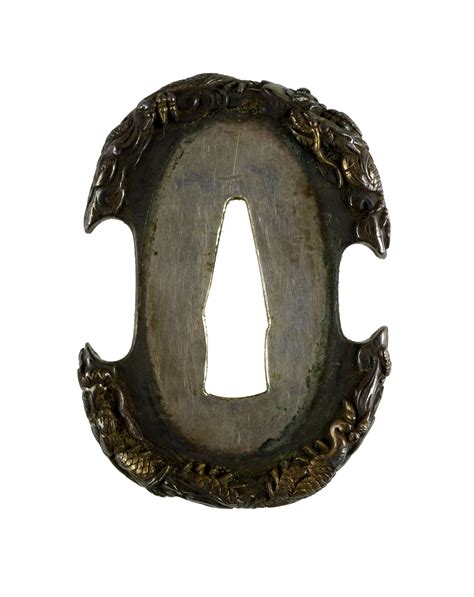 Tsuba with Dragons in Clouds | The Walters Art Museum