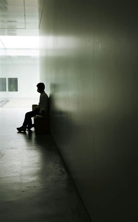 A person standing in a room photo – Free Human Image on Unsplash