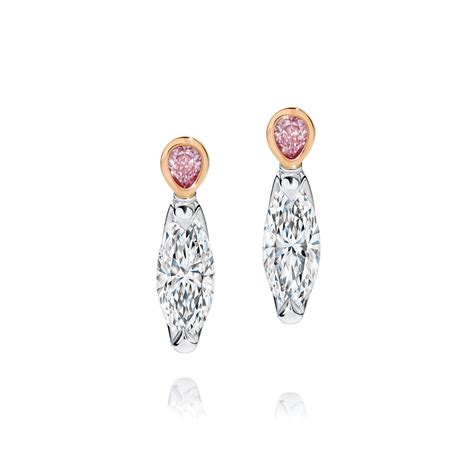 Platinum and rose gold diamond earrings with Argyle pink diamonds ...