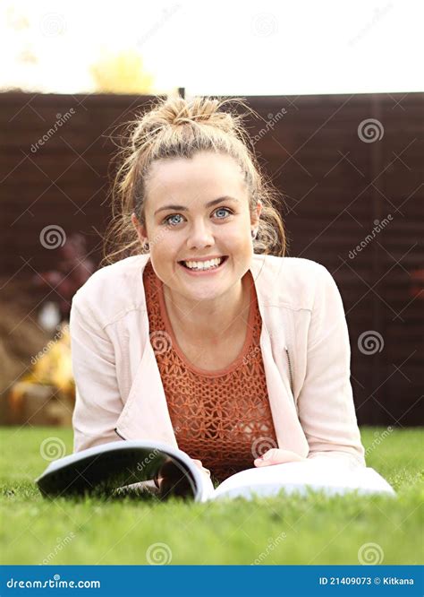 Reading a book outdoors stock image. Image of reading - 21409073