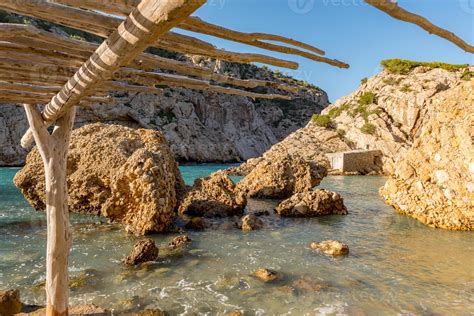 Turquoise waters in Es Portitxol, Ibiza, Spain. Hidden bay on the