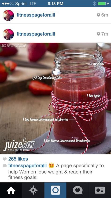 Two Jars Filled With Red Liquid Sitting On Top Of A Wooden Table Next