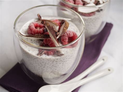 Vanilla Chia Pudding Topped With Fresh Coconut Shavings Raspberries