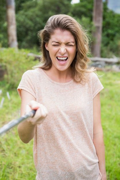 Premium Photo Smiling Woman Taking Selfies