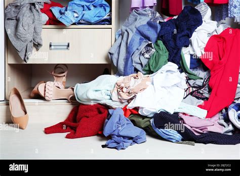 Pile Of Clothes On Floor Indoors Stock Photo Alamy