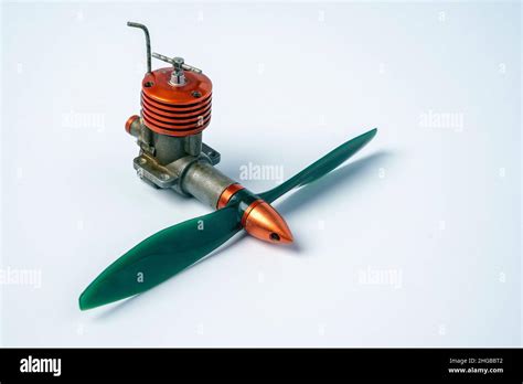 A small gasoline engine with a propeller for a controlled model of an ...