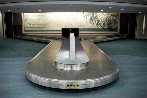 Airport Baggage Carousel Photograph by Henry Lederer