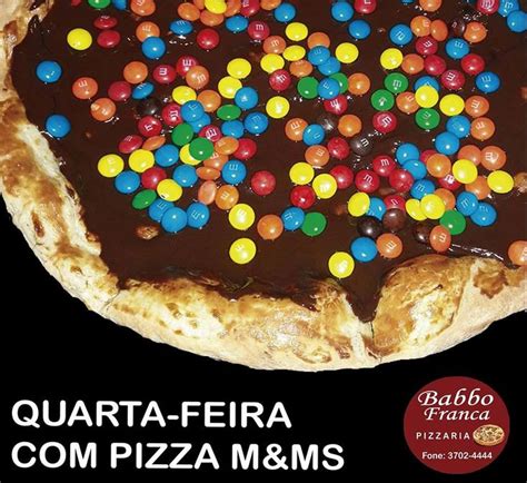 A Chocolate Pizza With M M S On It And The Words Quarta Feria