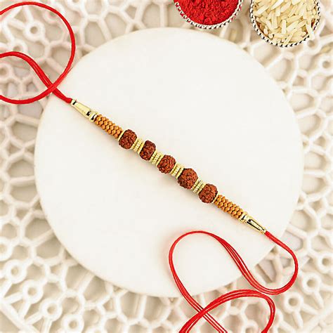 Buy Send Celestial Charms Rudraksha Rakhi Online Fnp