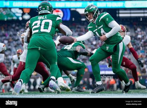 New York Jets Quarterback Trevor Siemian 14 Hands The Ball Off To New