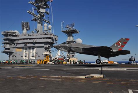 SNAFU!: Hi-rez pics of the F-35C carrier landing.