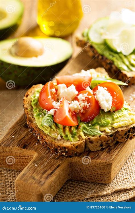 Avocado Toast With Tomatoes And Feta Stock Photo Image Of Appetizer