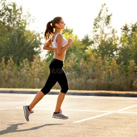 Athletic Runner Training in a Park for Marathon. Stock Image - Image of ...