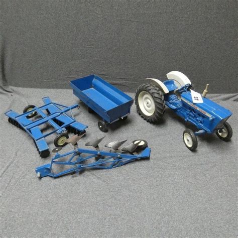 Ertl Farm Ford 4000 Tractor W Attachments Live And Online Auctions