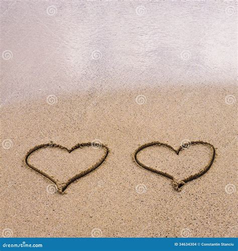 Symbols Of Two Hearts Drawn On Sand Stock Photo Image Of Relish