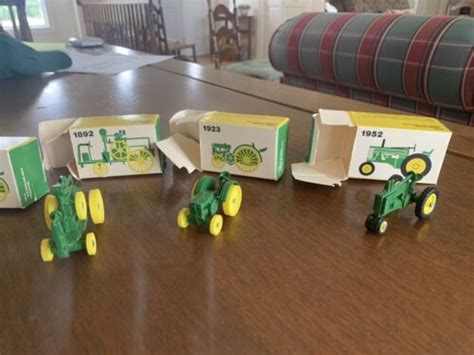 Seven John Deere Miniature Toy Tractors EBay