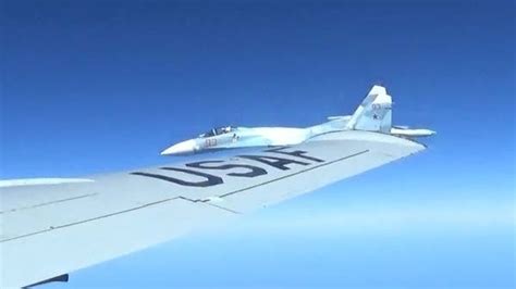 Pentagon releases images of Russian jet buzzing RC-135 spy plane | World News | Sky News