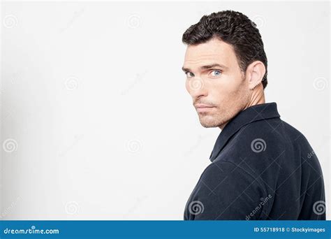 Calm Man Looking Back Over His Shoulder Stock Photo Image Of Back