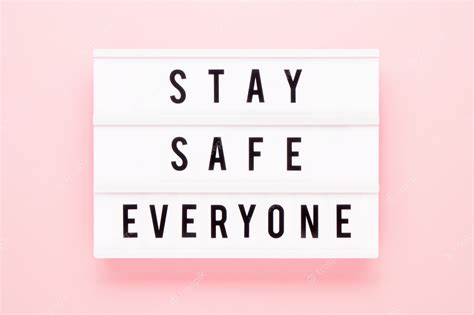 Premium Photo Stay Safe Everyone Written In Light Box On Pink