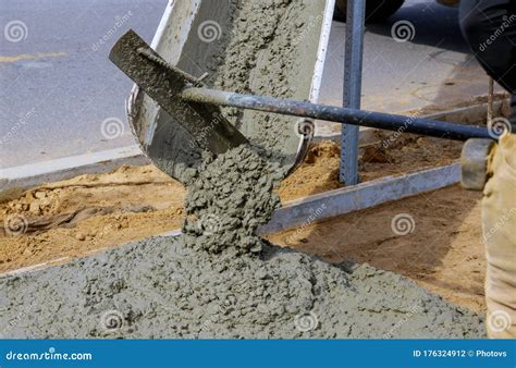 Concrete Truck with Pouring Cement during To Residential Street Stock ...