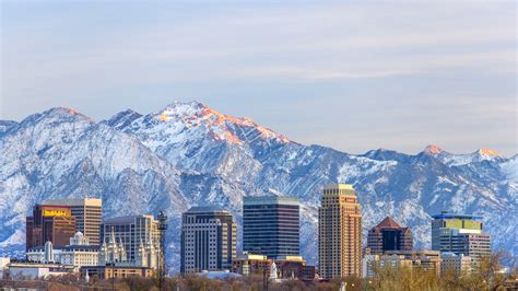 Salt Lake City with Snow Capped Mountain - Consumer Energy Alliance