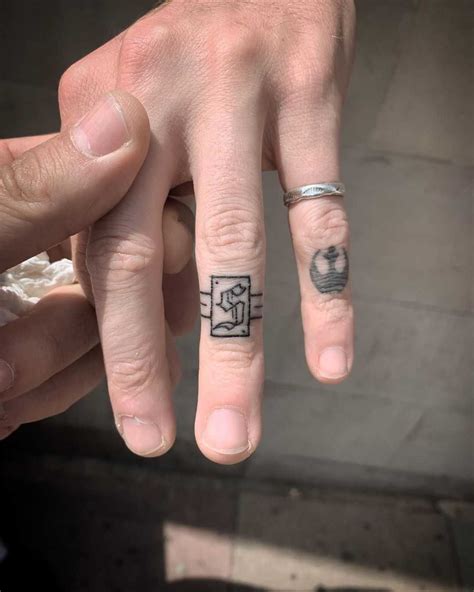 Hand Poked Ring Tattoo By Kirk Budden Tattoogrid Net