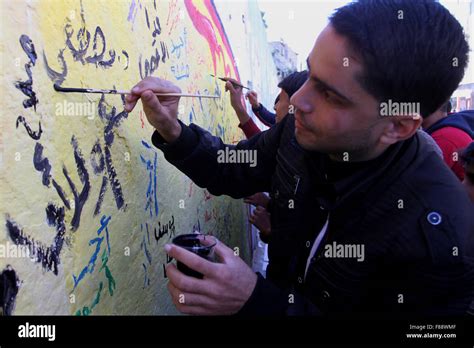 Rafah, Gaza Strip, Palestinian Territory. 7th Dec, 2015. Palestinians paint a mural during a ...