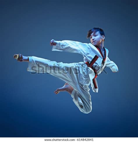 Karate Boys By Foot Kick Photos, Images and Pictures