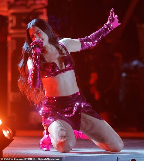 Dua Lipa Wears A Racy Sequinned Bra Top And Matching Mini Skirt As She Storms The Stage In