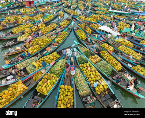 Aerial View Of Floating Market Of Seasonal Fruits On The Boats In