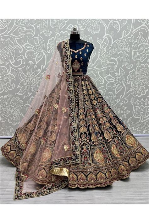 Brilliant Thread Embroidred Velvet Bridal Lehenga In Teal Color Lehenga