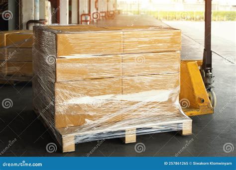 Packaging Boxes Wrapped Plastic Stacked On Pallets In Warehouse