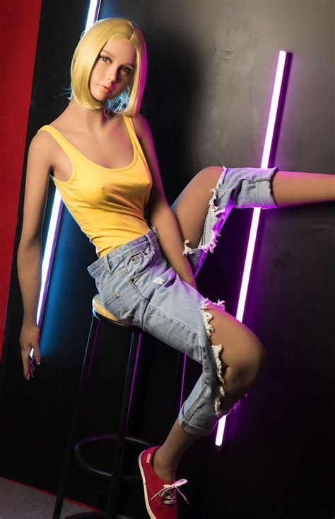 Blonde Sex Doll Mirta Poses Fully Clothed And Shows Her Slender Naked