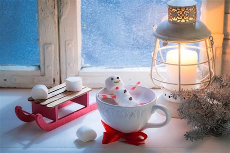 Premium Photo Relaxing In Hot Cocoa Snowman Made Of Marshmallows For Xmas