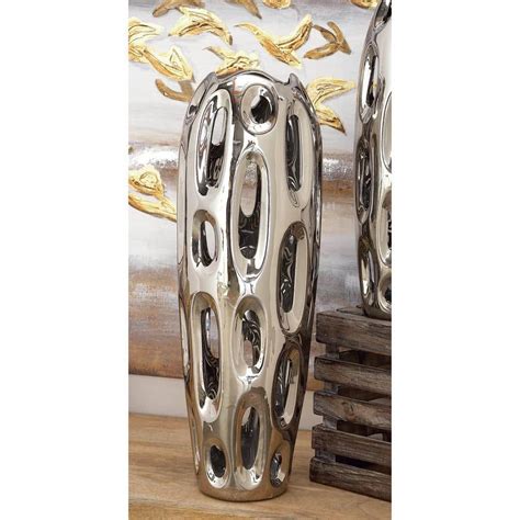 Litton Lane 21 In Silver Ceramic Decorative Vase With Cut Out Designs