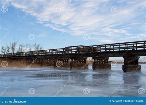 Old Bridge Over a Frozen River Stock Image - Image of walkway, bridge ...