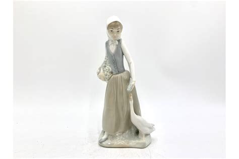 Porcelain Figurine Of A Woman With A Goose From Nao Lladro Spain