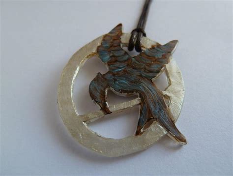 Hunger Games Mockingjay DIY Pendant | AllFreeJewelryMaking.com