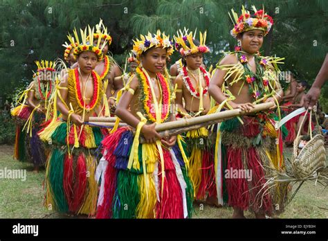 Yapese Girls In Traditional Clothing Dancing With Bamboo Pole At Yap