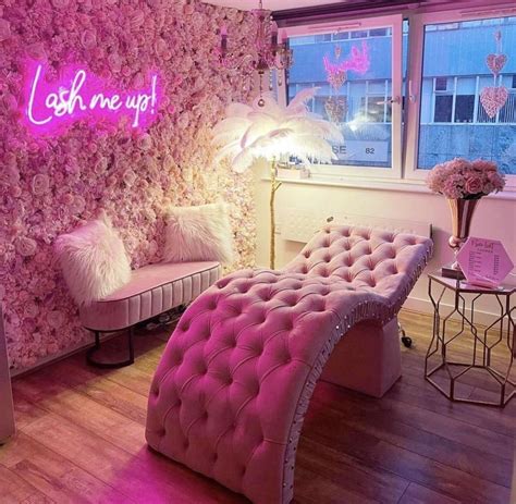 Esthetician Room Decor With Pink Furniture And Neon Sign