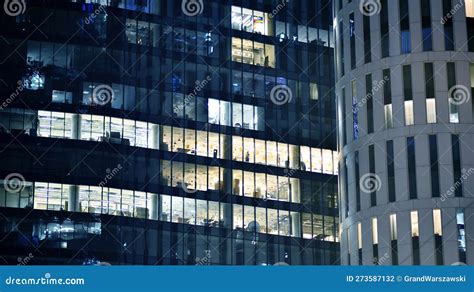 Pattern Of Office Buildings Windows Illuminated At Night Stock Photo