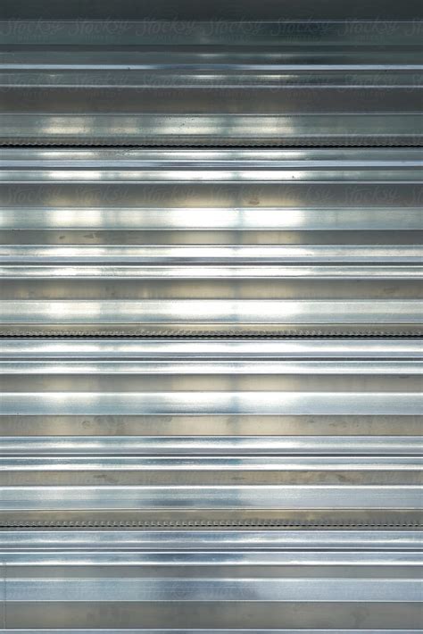 "Strom Shutters On Concrete Home In Florida Before The Storm" by