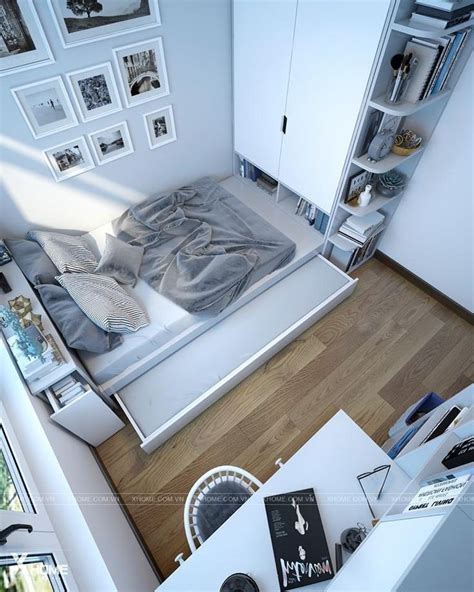 An Aerial View Of A Bedroom With A Bed Desk And Bookshelf In It