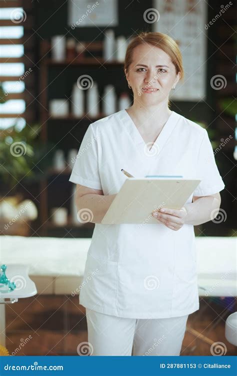 Portrait Of Smiling Massage Therapist Woman In Spa Salon Stock Image