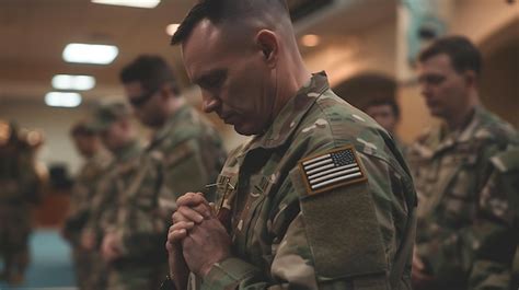 Premium Photo A Soldier Prays Before Going Into Battle He Is Wearing