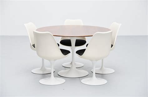 Mid Century Eero Saarinen Swivel Tulip Chairs And Early Cast Iron