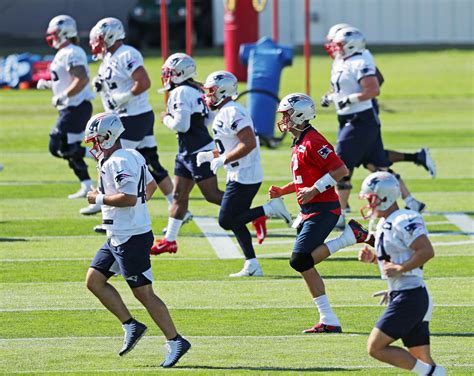 14 Photos Of Patriots Players Doing Their Jobs On The First Day Of