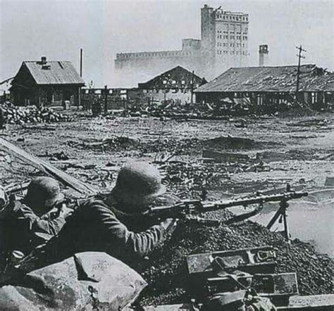 A German Machinegun Team From The Th Infantry Division Covering The