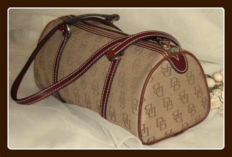 Dooney Signature Canvas Barrel Bag